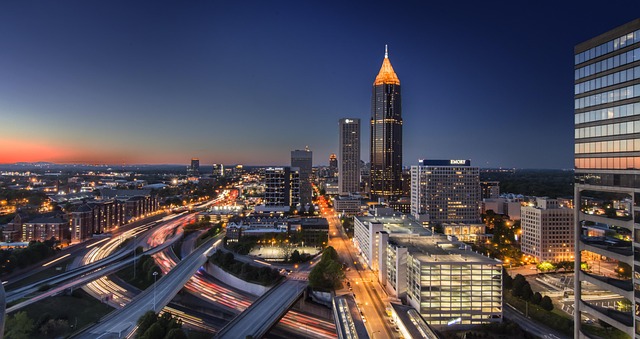 Atlanta city skyline at twilight with tall buildings and highway lights